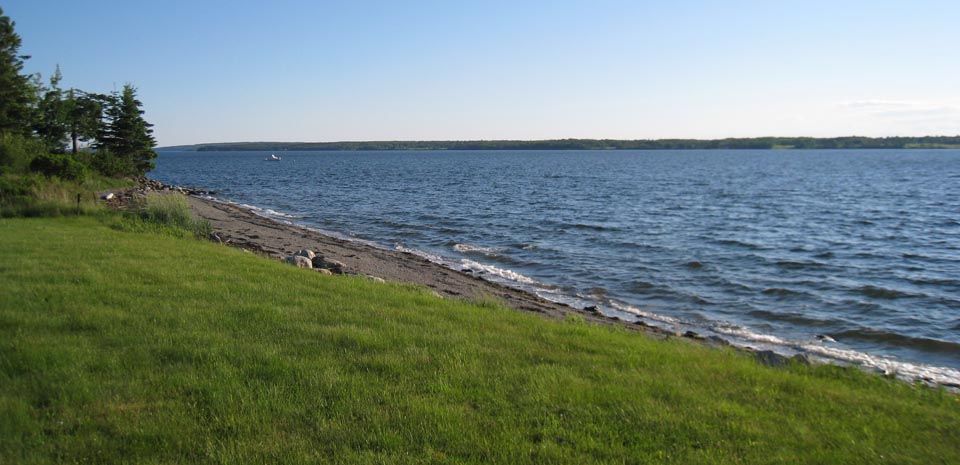 Immaculate Lawn Leading to Beach